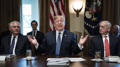 Trump flanked by Secretary of State Rex Tillerson, left, and Defense Secretary Jim Mattis, right, during a Cabinet meeting in 2017