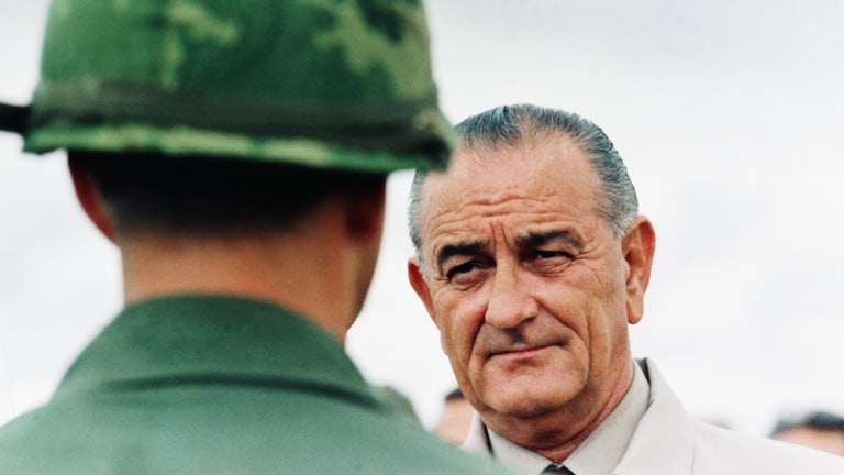 President Lyndon B. Johnson meets soldiers