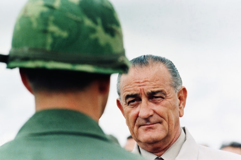 President Lyndon B. Johnson meets soldiers