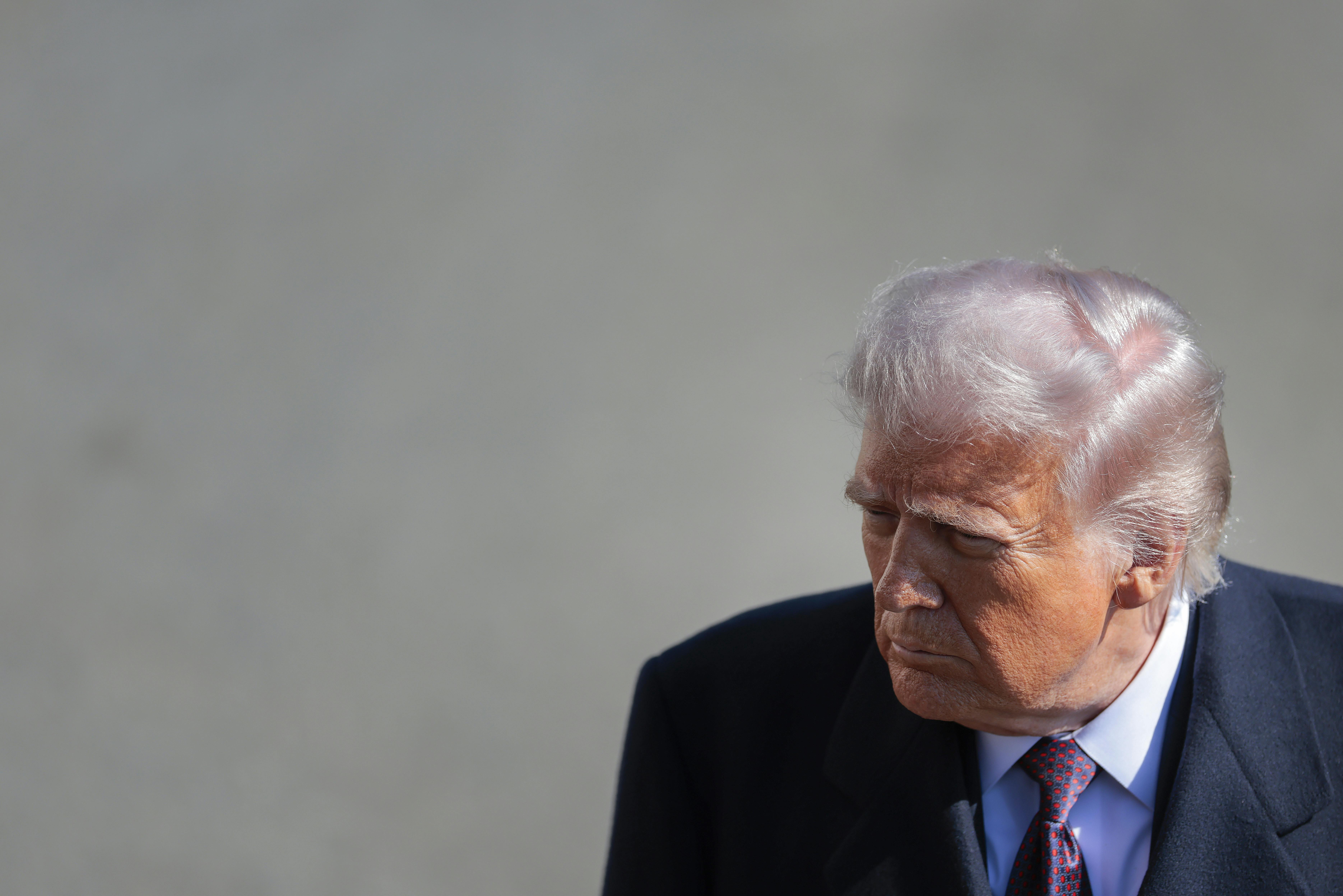 Donald Trump's face makeup looks particularly orange, with his neck much paler.