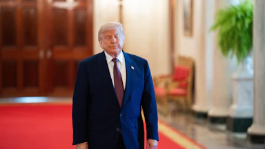 Donald Trump arrives for a Medal of Honor ceremony in the East Room of the White House.
