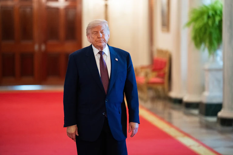 Donald Trump arrives for a Medal of Honor ceremony in the East Room of the White House.