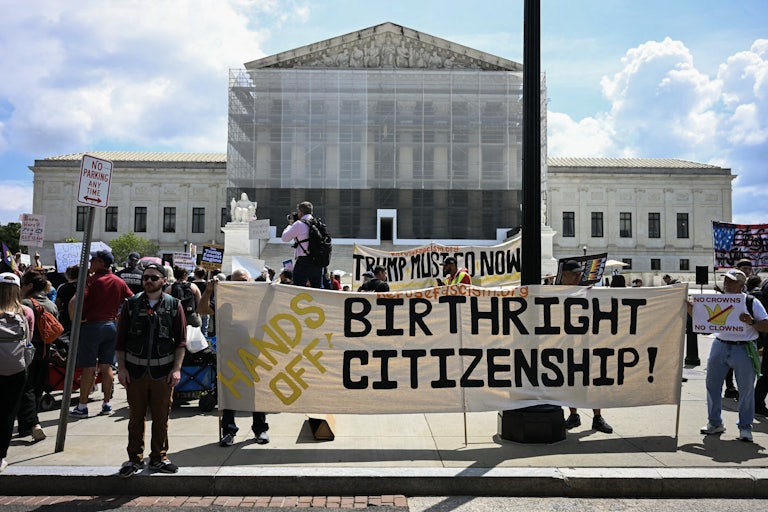 People protest in support of birthright citizenship outside the Supreme Court