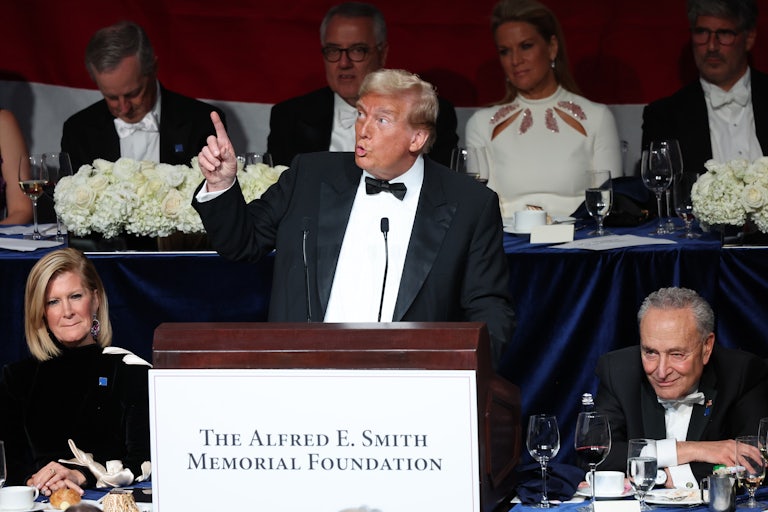 Donald Trump points and looks up while speaking at the Al Smith Memorial Foundation dinner