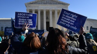 Abortion rights protesters gather outside the Supreme Court.