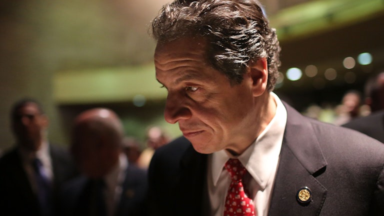 Andrew Cuomo pauses after delivering his State of the State and budget proposals at The City College of New York