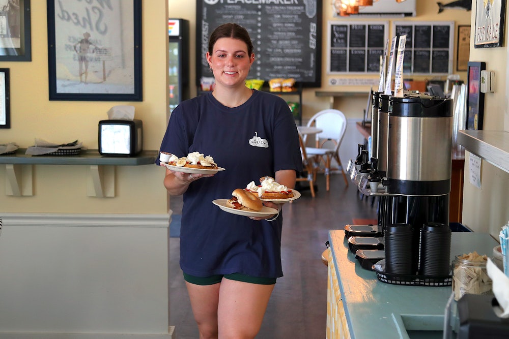 A teenager working a summer job