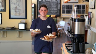 A teenager working a summer job