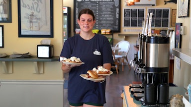 A teenager working a summer job
