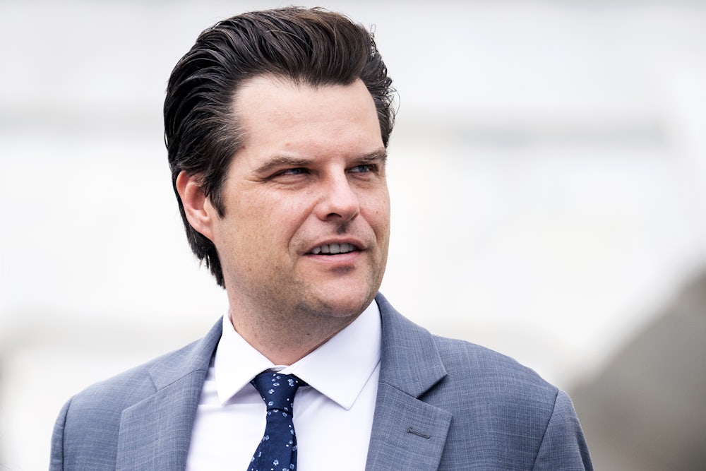 Matt Gaetz grins bizarrely