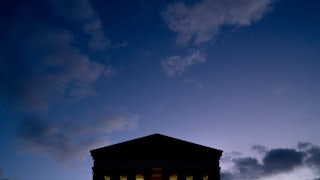 Clouds are seen in the sky above the US Supreme Court at dusk in Washington, DC