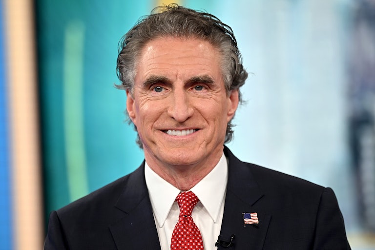 Doug Bergum smiles in a TV studio