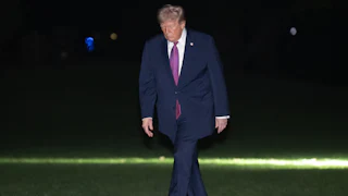Donald Trump walking on the South Lawn of the White House