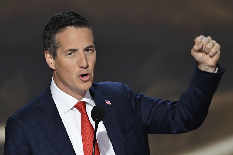 Bernie Moreno raises his fist while speaking at the Republican National Convention