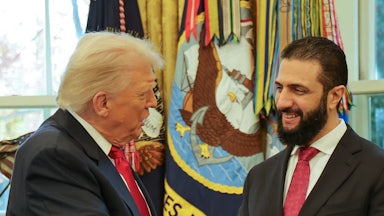 Donald Trump speaks to Syrian President Ahmed al-Sharaa at the White House.