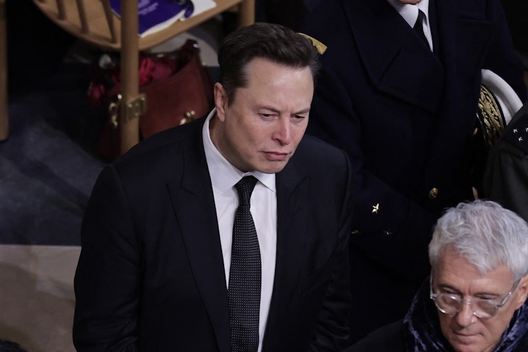 Elon Musk, brows furrowed