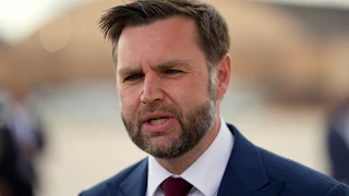 JD Vance stares, looking a bit puzzled