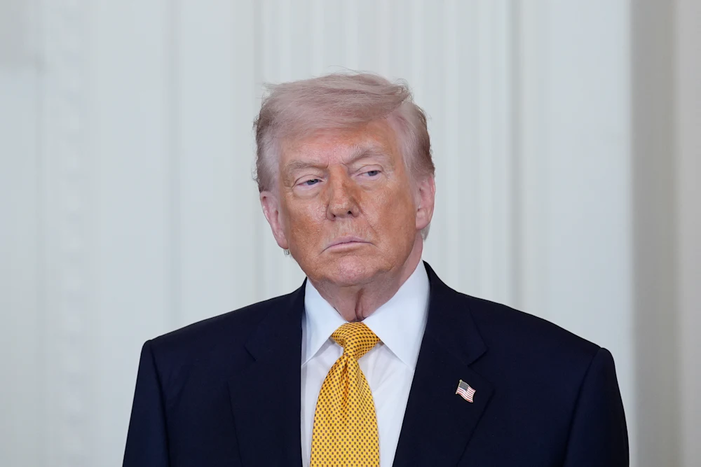 Trump glances to his left side