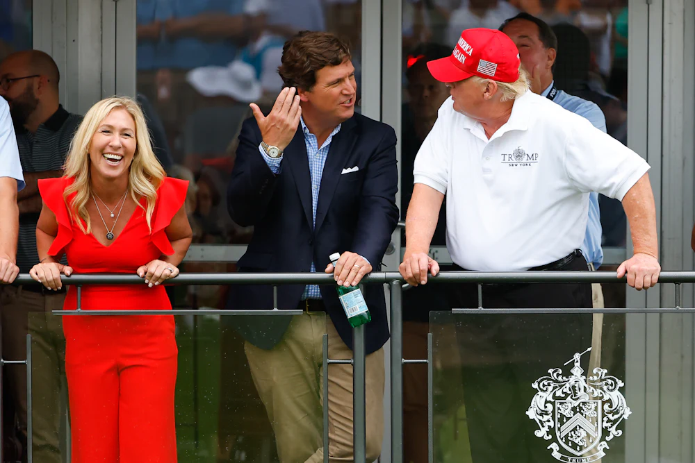 Tucker Carlson and Marjorie Taylor Greene with Trump
