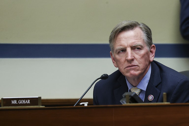 A close up of a scowling Paul Gosar.