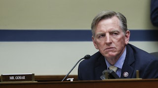A close up of a scowling Paul Gosar.