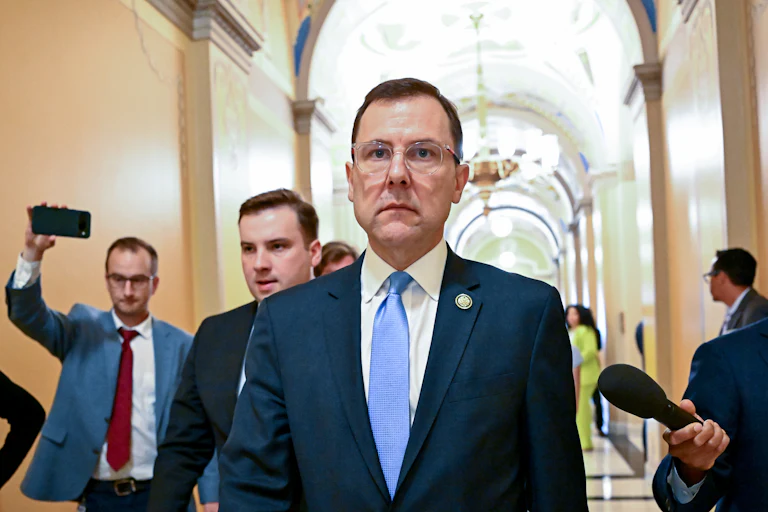 Representative Tom Kean Jr. walks in the Capitol.