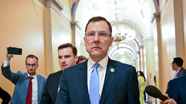 Representative Tom Kean Jr. walks in the Capitol
