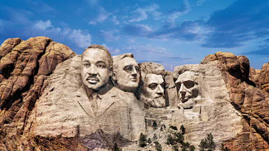 A digitally altered photograph of Mount Rushmore depicting four faces carved into the mountain in place of the original presidents. From left to right: a figure resembling Martin Luther King, FDR, Frederick Douglass, and Lincoln.