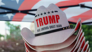 Stack of "Trump Make America Great Again" cowboy hats