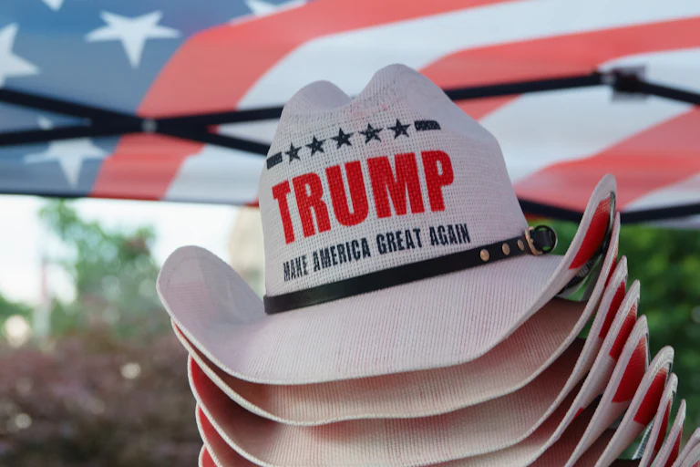 Stack of "Trump Make America Great Again" cowboy hats