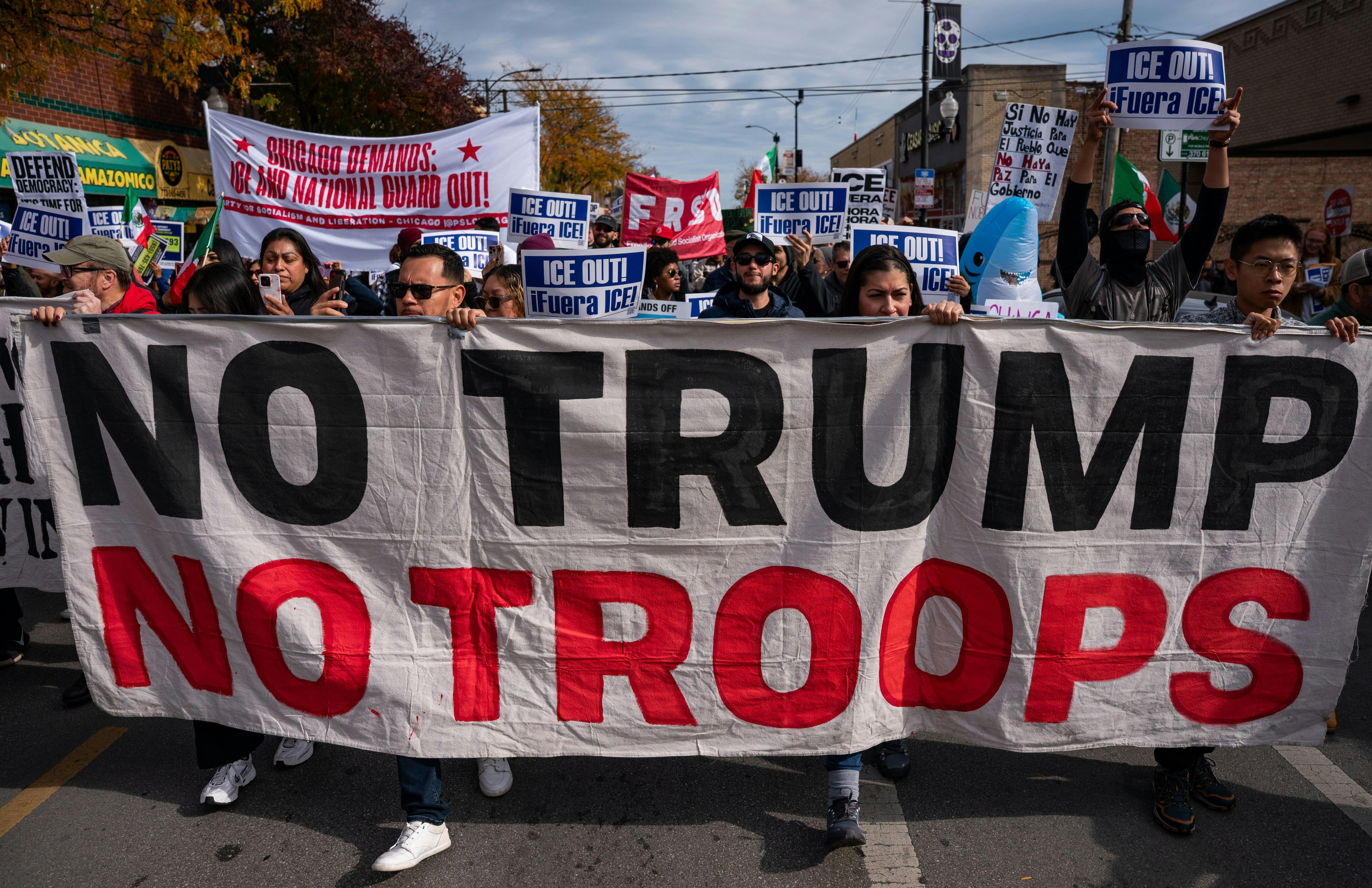 People protest in Chicago against the presence of federal immigration agents