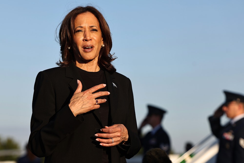 Kamala Harris speaks to the media before boarding Air Force Two after assessing the Hurricane Helene recovery response in North Carolina.