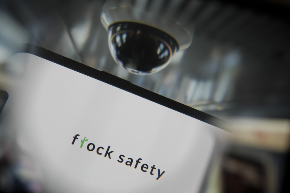 In this photo illustration, Flock Safety logo is being displayed on a mobile phone screen.