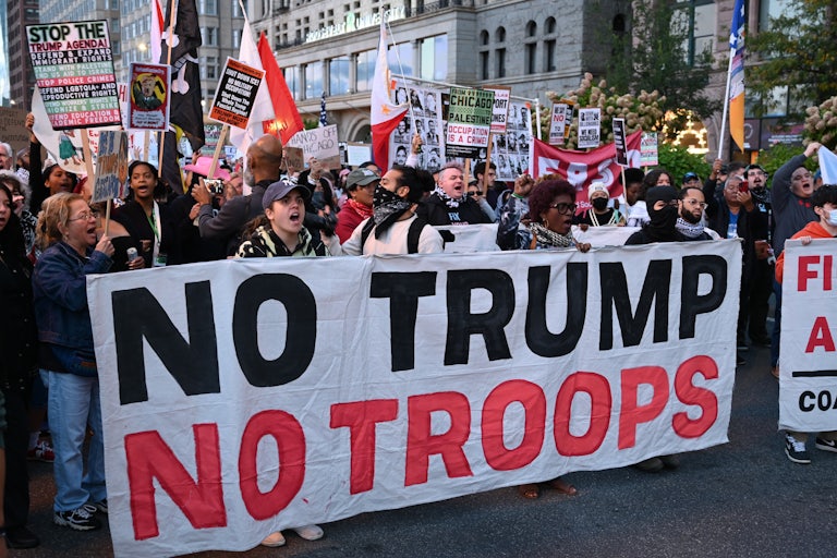People protest against the presence of federal troops in Chicago