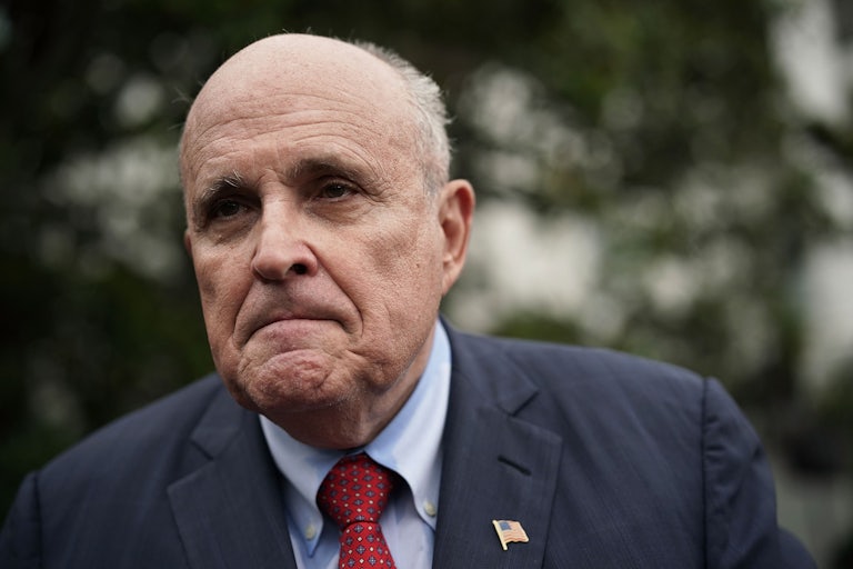 Rudy Giuliani frowns