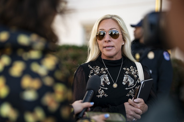 Representative Marjorie Taylor Greene speaks to reporters.