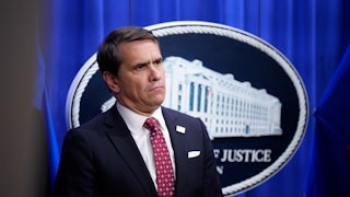 Deputy Attorney General Todd Blanche stands during a press briefing