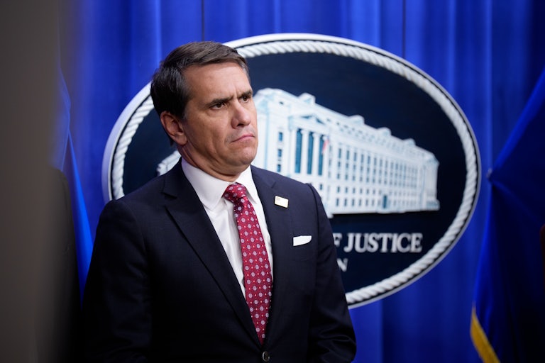 Deputy Attorney General Todd Blanche stands during a press briefing