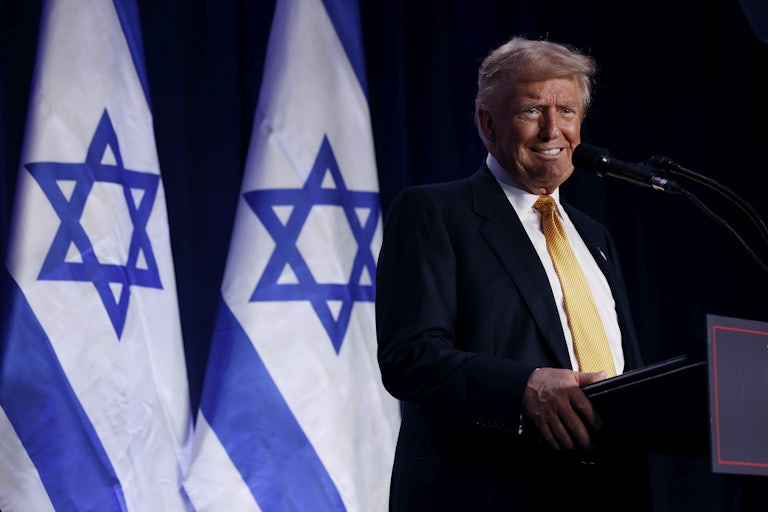 Donald Trump smiles while at an event hosted by the Israeli American Council