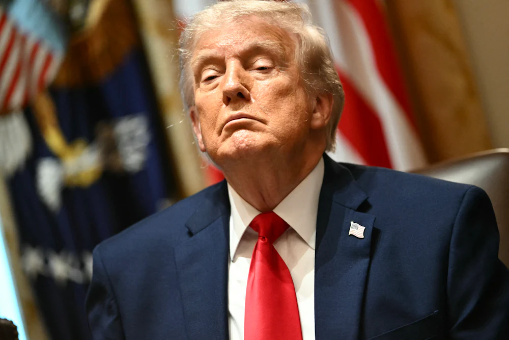 Donald Trump frowns while glaring