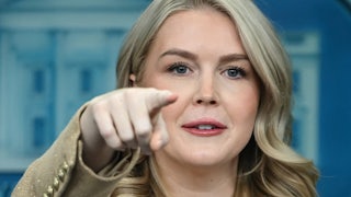 Karoline Leavitt points during a White House press briefing