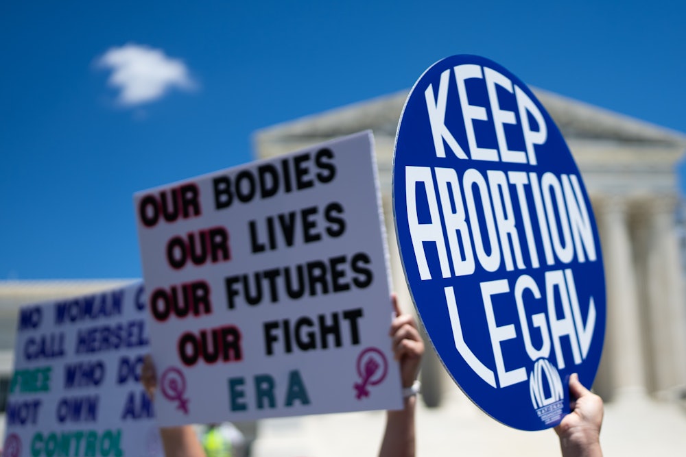 National Women's Strike holds a protest marking the second anniversary of Dobbs v. Jackson, the Supreme Court decision that overturned Roe v. Wade.