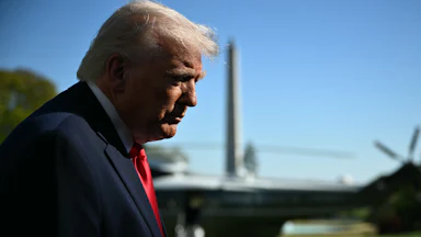 Donald Trump speaks with reporters prior to boarding Marine One.