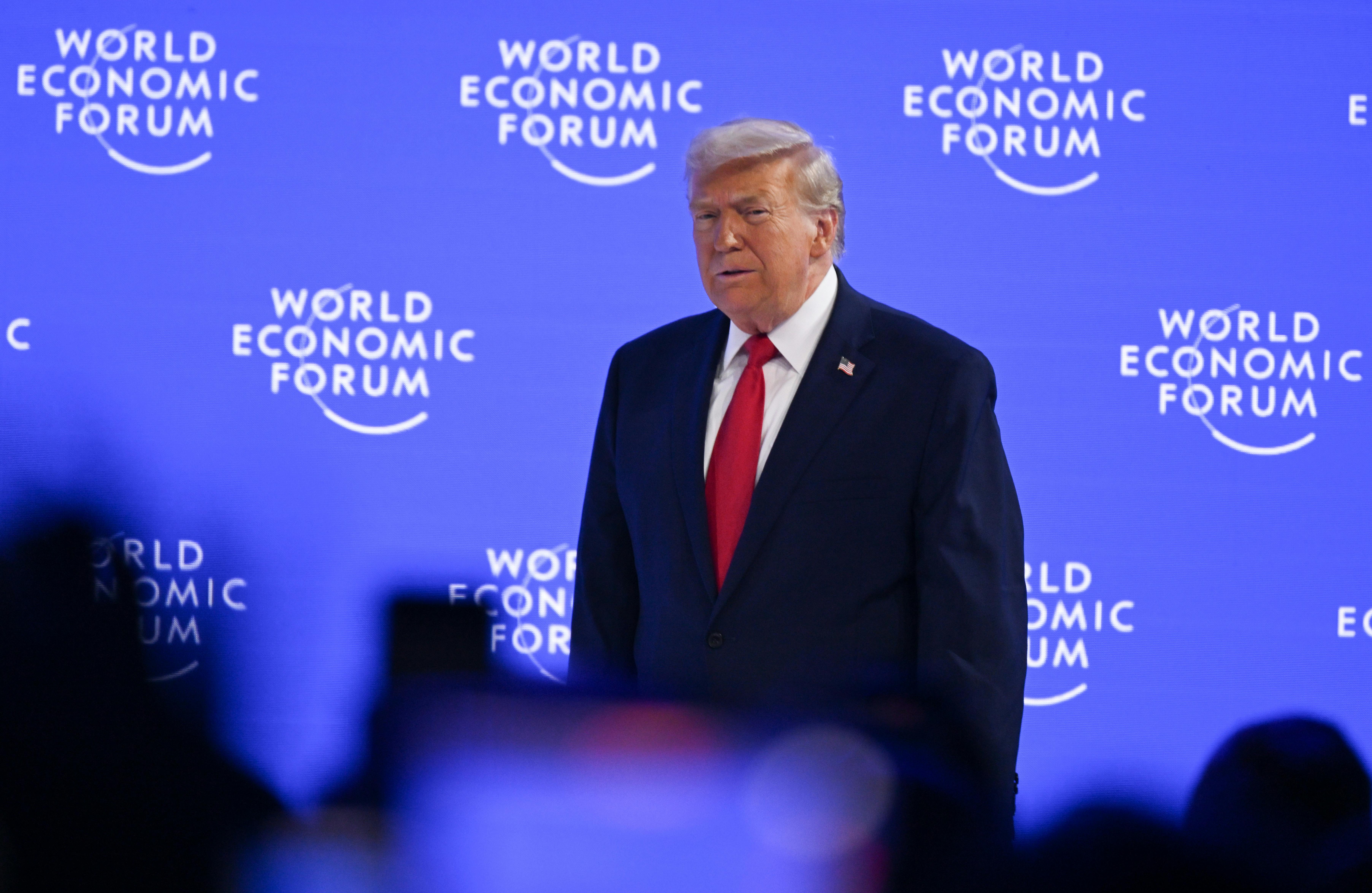 Donald Trump walks on stage at the World Economic Forum in Davos.