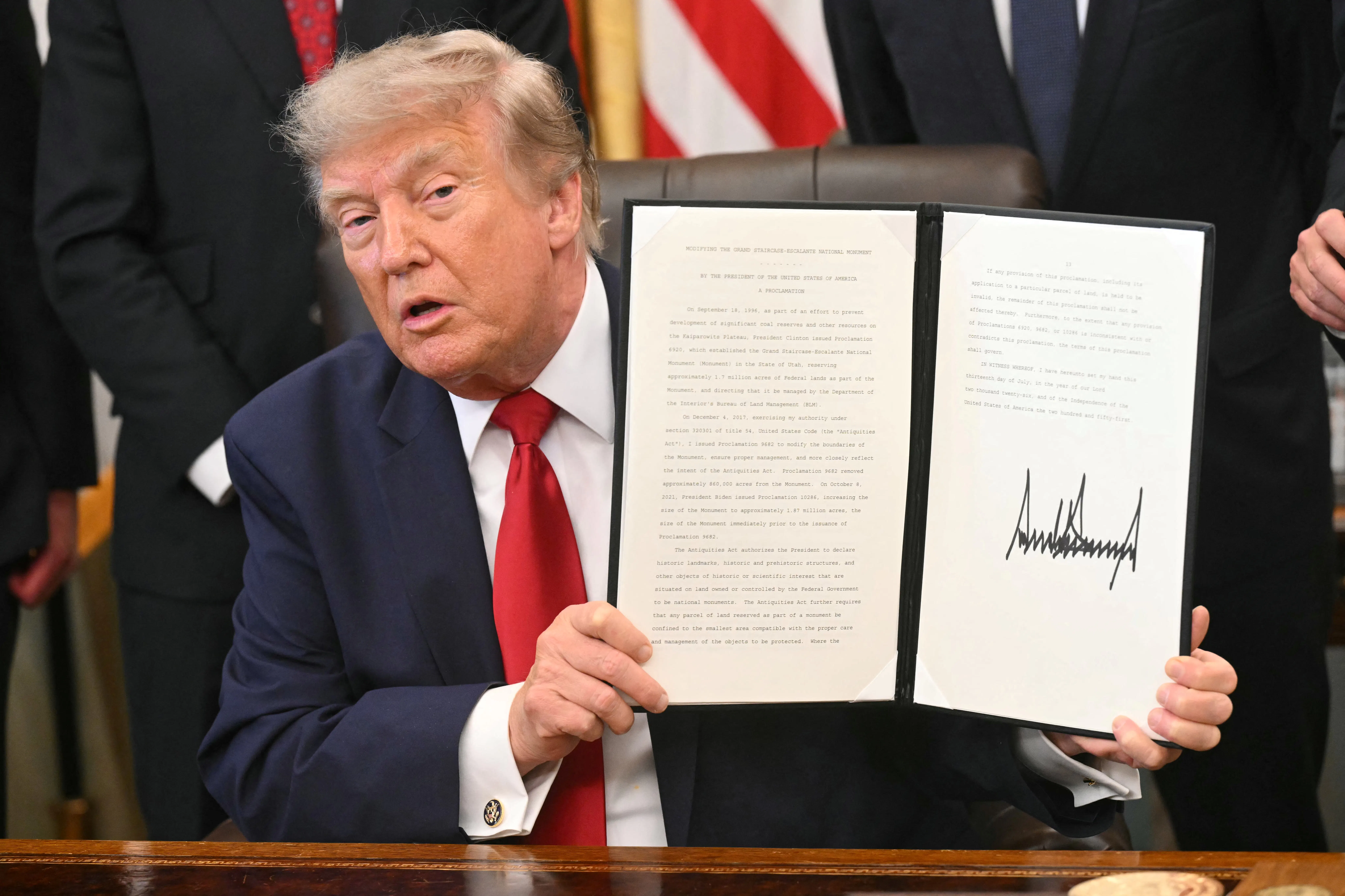 Donald Trump signing an executive order 