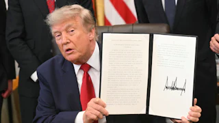 Donald Trump signing an executive order
