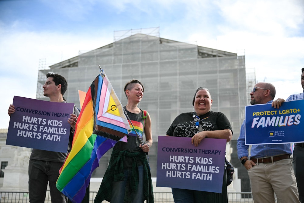 Demonstrators protest against conversion therapy outside the U.S. Supreme Court as the Court hears oral arguements in Chiles v. Salazar, a landmark case on conversion therapy.