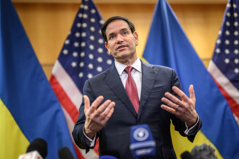 Secretary of State Marco Rubio gestures and speaks during a press conference in Geneva