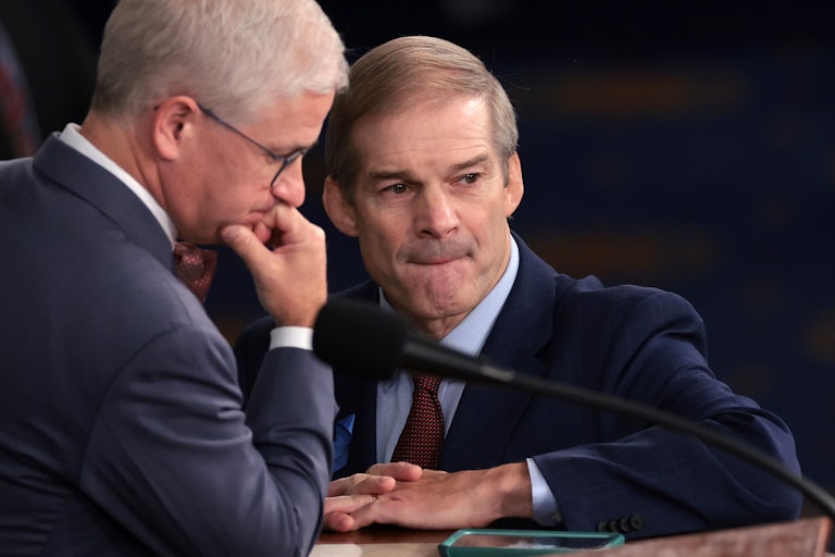 Rep. Jim Jordan talks to Speaker Pro Tempore Rep. Patrick McHenry