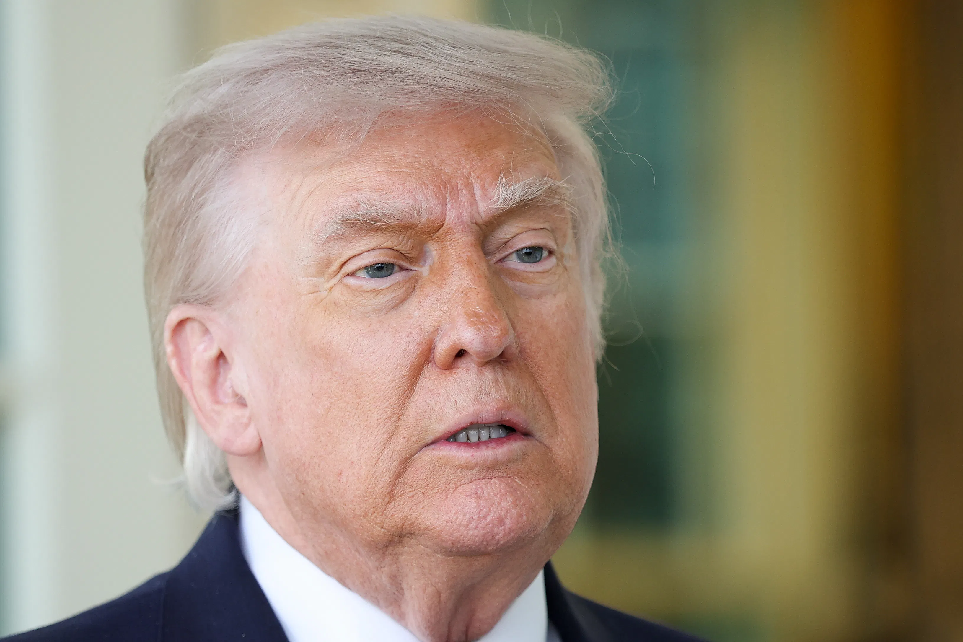 President Donald Trump grimaces